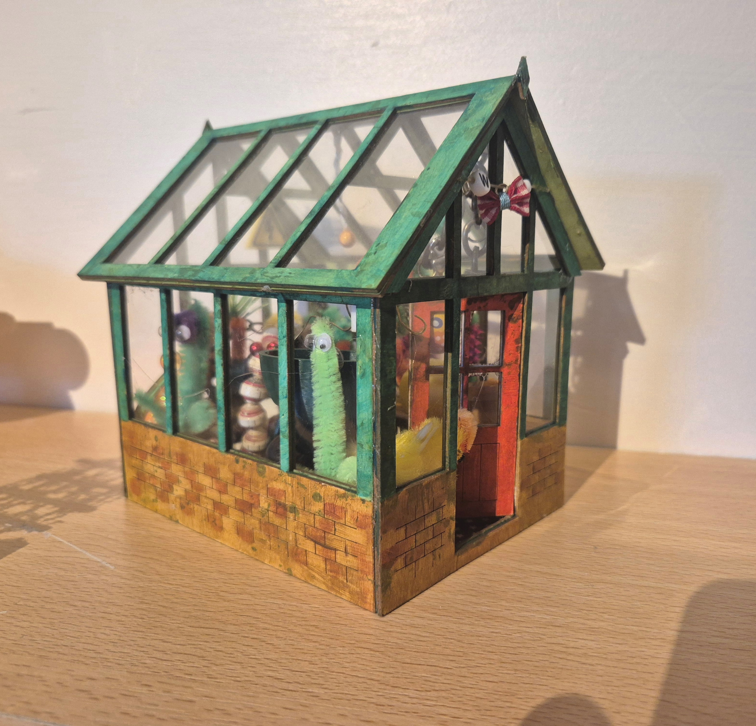 Outside the Greenhouse by Caroline